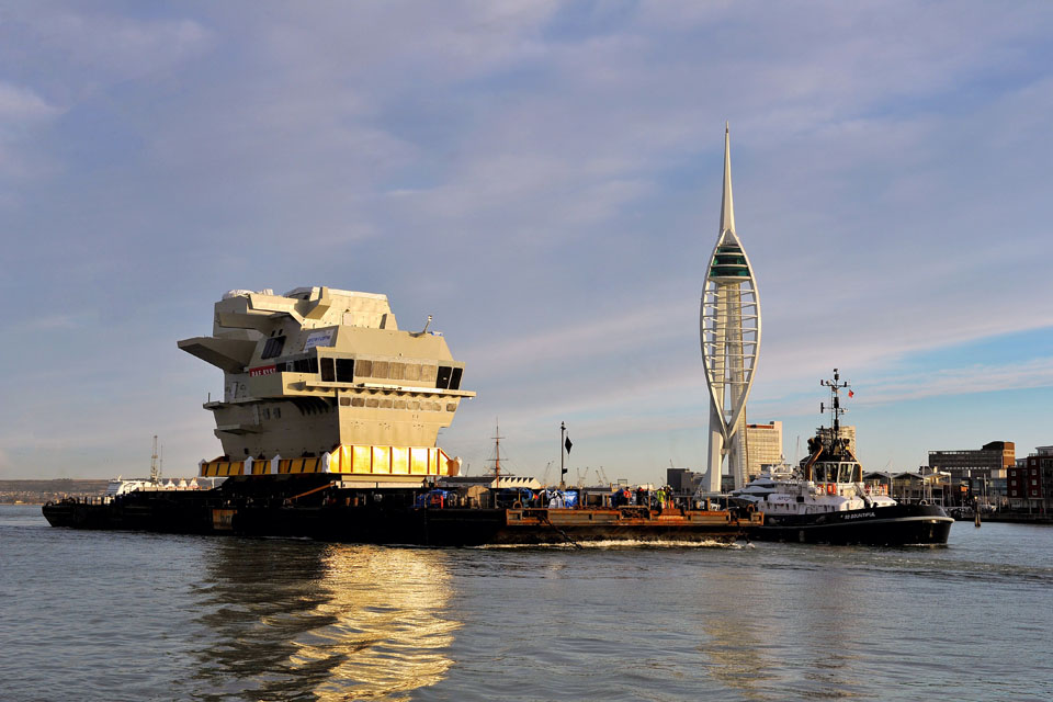 The forward island section of HMS Queen Elizabeth leaves Portsmouth Naval Base