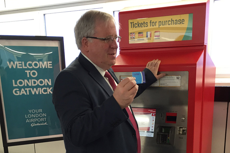 Transport Secretary uses Oyster card at Gatwick Airport.