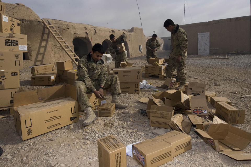 Gurkha soldiers pack up rations at Patrol Base 4