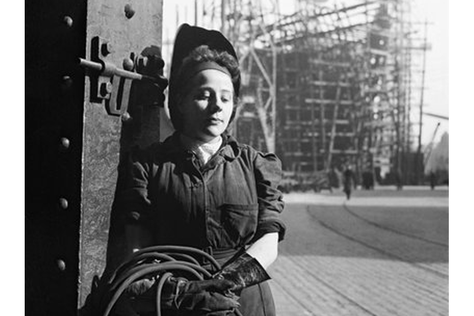 Here Cecil Beaton captures a welder working on the deck of a new ship in Tyneside, 1943. 