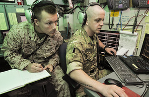 Aerospace Battle Managers Corporal Bobby Howard, US Marine Corps, and Corporal Paddy Bonner, Royal Air Force, working together at Camp Leatherneck, Helmand province, southern Afghanistan