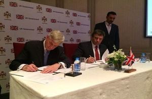 British Ambassador and Minister of Labour signing a Memorandum of Understanding to launch a UK-funded project to help resolve workplace disputes