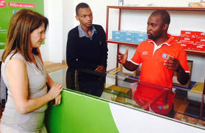 International Development Minister Lynne Featherstone talking to a shopkeeper in Mozambique. Picture: Julia Smith/DFID