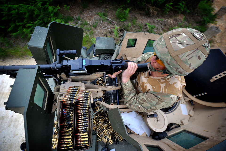 Royal Marine in a Viking amphibious vehicle