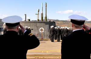 The White Ensign - the flag of the Royal Navy - is raised onboard HMS Ambush [Picture: Petty Officer (Photographer) Ian Arthur, Crown copyright]