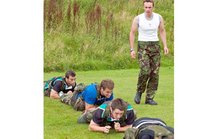 Corporal Neil Owen puts some of the Nottingham rugby players through their paces [Picture: Ian Forshaw, Crown Copyright/MOD 2010]