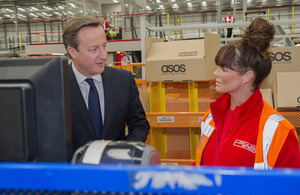 David Cameron meets a member of staff at ASOS.