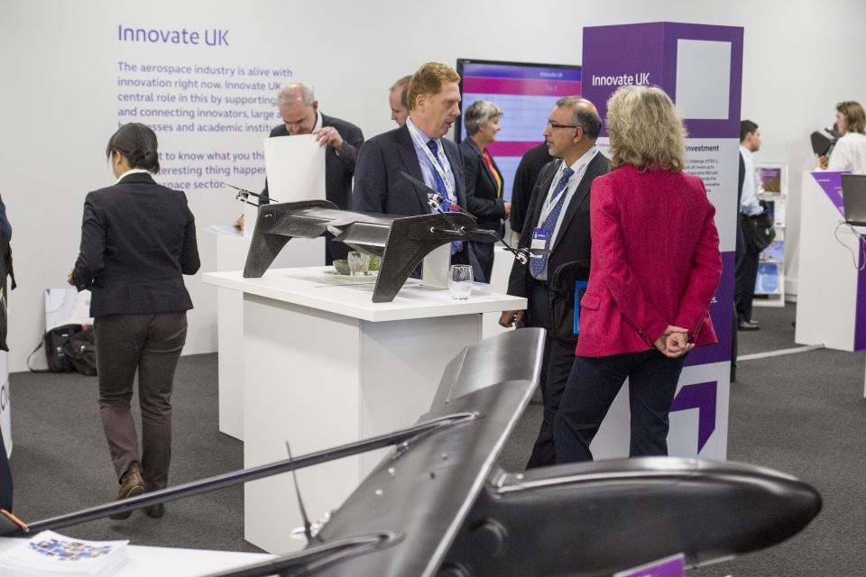 Innovate UK exhibition area at Aerodays 2015, with a UAV in the foreground.