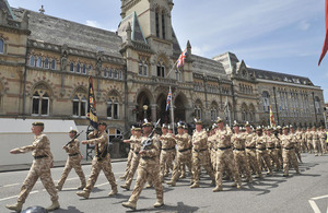 Soldiers from 11 Light Brigade march through the streets of Winchester