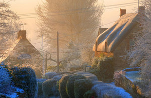 Frost covered houses and gardens.