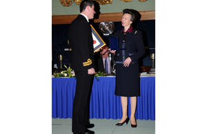 Lieutenant Commander Graham Chesterman collects the Edward and Maisie Lewis Award