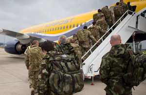 A joint Irish Defence Force and British Army training and mentoring team boards an aircraft at RAF Brize Norton headed for Mali [Picture: Steve Lympany, Crown copyright 2013]