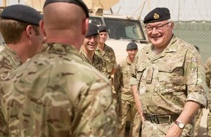 General Sir Peter Wall shares a laugh with soldiers of the Queen's Dragoon Guards [Picture: Cpl Daniel Wiepen, Crown copyright]