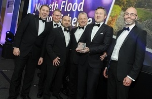 Image shows the award being collected on the night