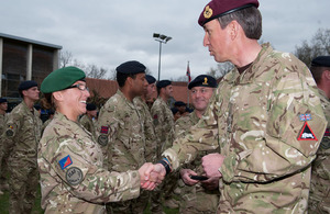 Private receives her Afghanistan campaign medal from Major General James Bashall at a parade in Paderborn, Germany