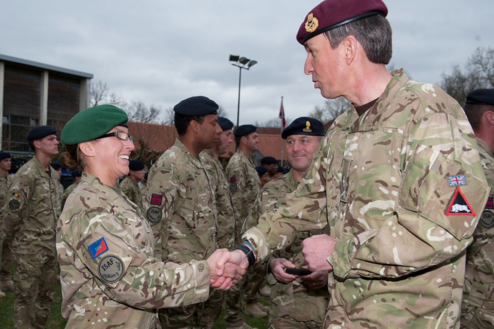 Soldier receives medal after work with Afghan women