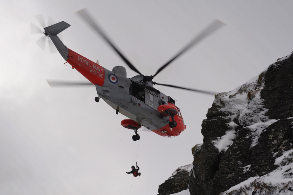 Royal Navy helicopter plucks three to safety in treacherous weather conditions