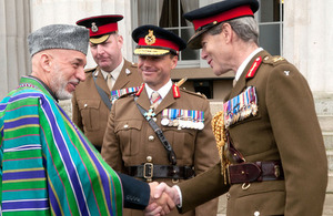 Afghan President Hamid Karzai shakes hands with Lieutenant General Sir Adrian Bradshaw during his visit to the Royal Military Academy Sandhurst [Picture: Mike Smith, Crown copyright]