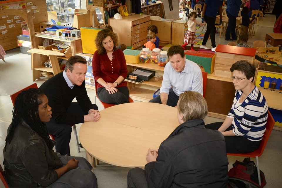 David Cameron and Nick Clegg on a childcare visit 