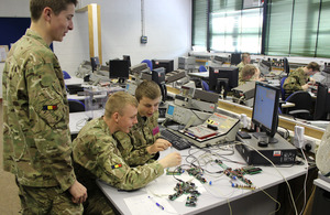 Craftsmen apprentices from the Defence School of Electronic and Mechanical Engineering constructing a climate control system [Picture: Major Paul Britton, Crown copyright]
