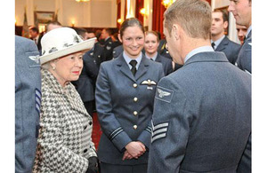 Her Majesty The Queen talking to Flight Lieutenant Shasha Sheard and Sergeant Mick Goddard at RAF Marham [Picture: Corporal Trish Morrison, Crown Copyright/MOD 2012]