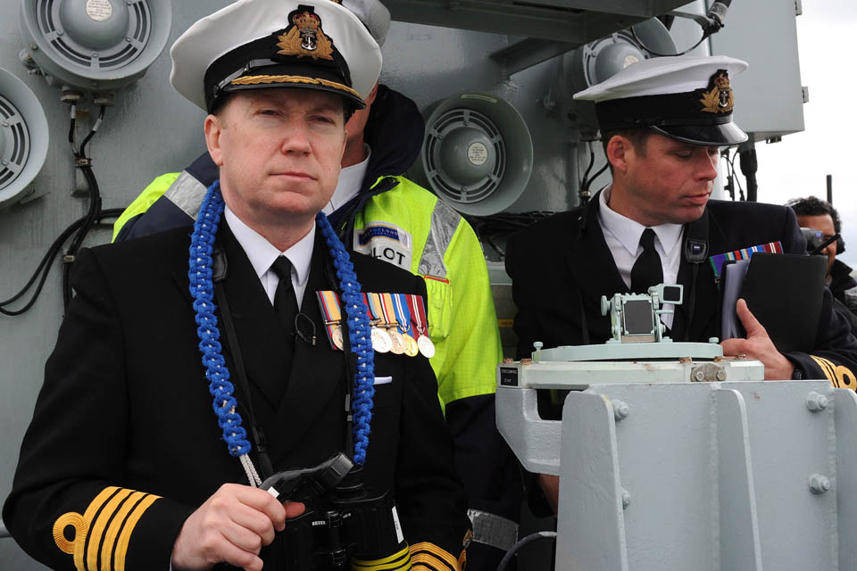 HMS Illustrious's Commanding Officer, Captain Martin Connell, takes charge