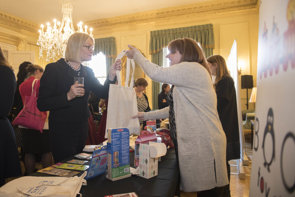 Margot James buying items from a small business at a Number 10 event