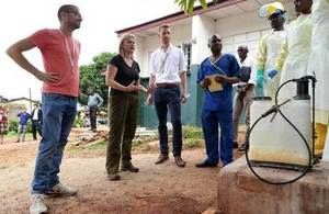 Justine Greening with British nurse Will Pooley in Sierra Leone. Picture: Staff Sergeant Tom Robinson/MOD