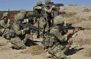 Members of Lima Company, 42 Commando Royal Marines, conducting section attack drills as part of their training package