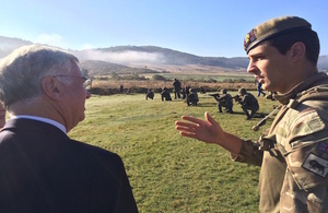 Defence Secretary Michael Fallon with Lt Edmund Harmer of 4 Platoon 2 Company Grenadier Guards at Biza training area.