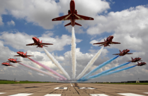 Pictured are The Red Arrows performing a low level flypast over 04 threshold at RAF Scampton.