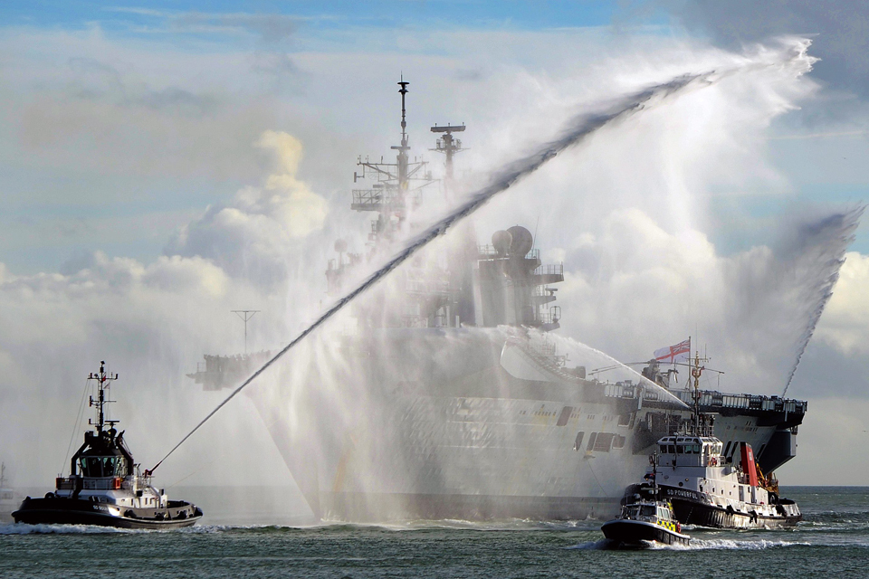 Royal Navy carrier returns home from Philippines