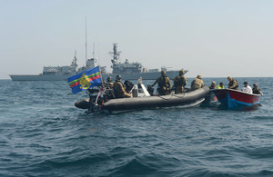 A boarding team from HMS Northumberland apprehends the drug smugglers [Picture: Leading Airman (Photographer) Maxine Davies, Crown copyright]