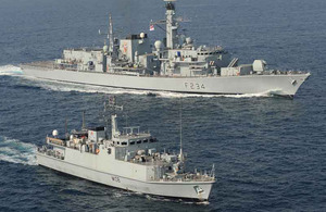 HMS Iron Duke (top) and HMS Grimsby in the Gulf