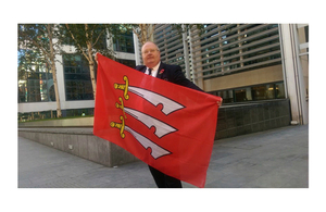 Secretary of State with Essex flag