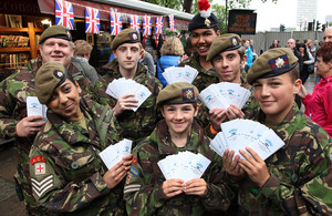 Members of the North East London Army Cadet Force display some of the Thames Jubilee Pageant information leaflets that they were distributing
