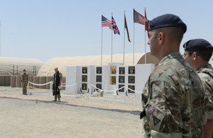 Service personnel at a flag ceremony at Camp Bastion to mark the relocation of Task Force Helmand [Picture: Sergeant Barry Pope, Crown copyright]