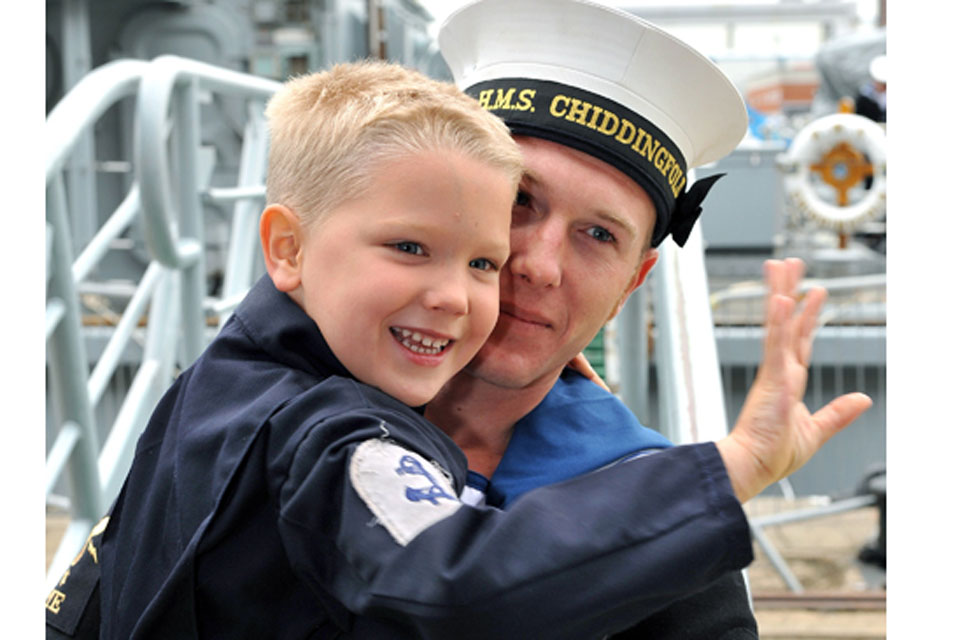 Leading Engineering Technician (Marine Engineer) Lee greets his son Edward