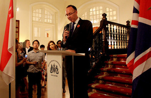 High Commissioner addressing the guests.