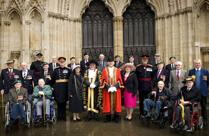The 18 Kohima veterans on the steps of York Minster with senior military officials and (centre) the Deputy Lord Mayor of York, Councillor John Galvin, and the Lord Mayor of York, Councillor David Horton