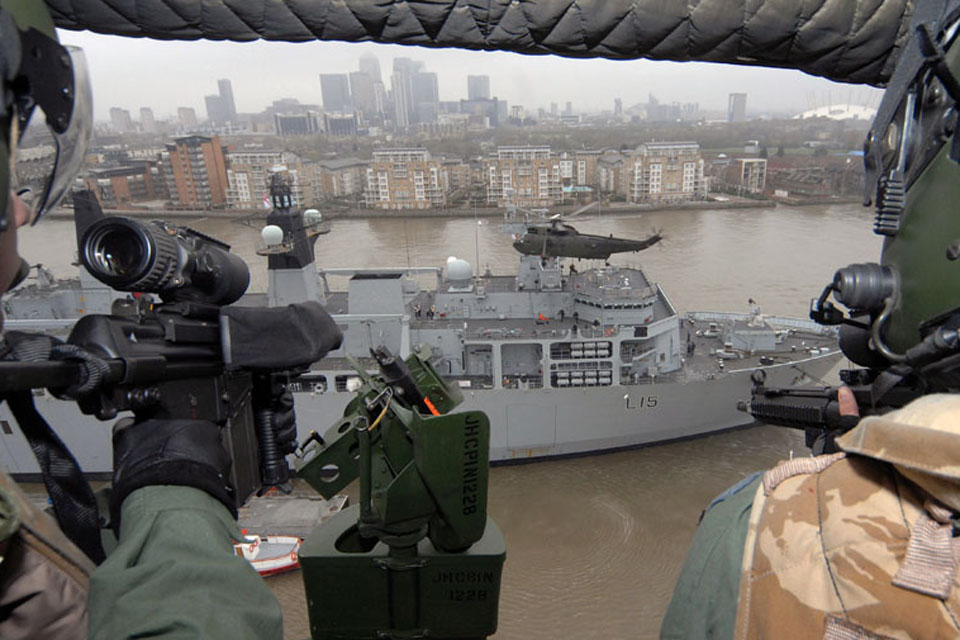 Flight deck activities on HMS Bulwark observed by the crew of a Sea King helicopter