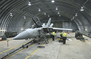 A missile being loaded onto a Tornado F3 for a flight trial