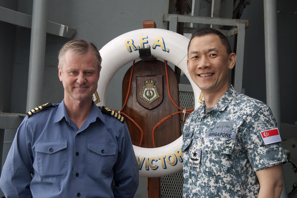 Captain Kevin Rimmell (left) with Rear Admiral Giam Hock Koon