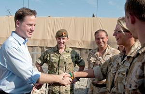 Deputy Prime Minister Nick Clegg congratulates Catherine Graham on her promotion to Lance Corporal
