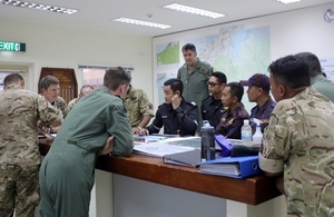 British Garrison and the Brunei Fire and Rescue Department meeting to discuss fire fighting efforts
