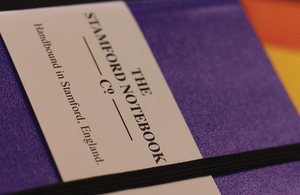 A purple notebook from The Stamford Notebook Company