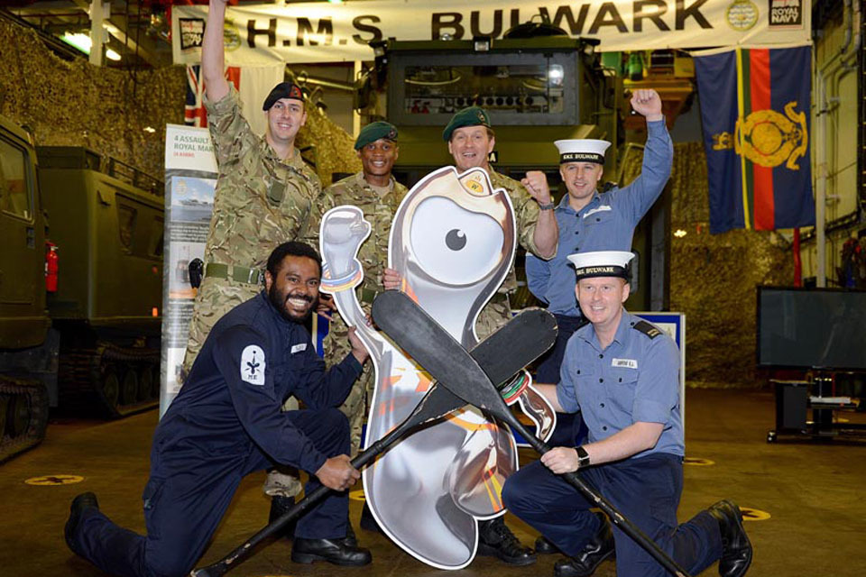 Flagship Bulwark cheers on Navy Olympian Reed