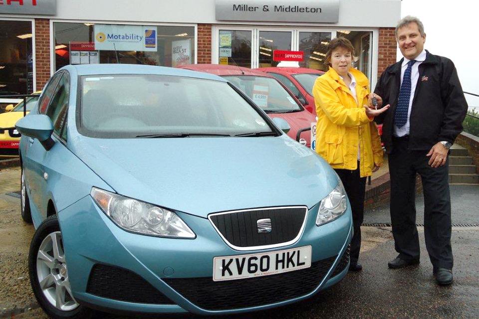Local woman collects keys to new car after online win