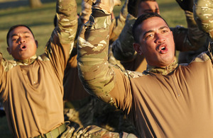 Tongan troops perform their fearsome war dance, the 'Sipi Tau', at RAF Honington