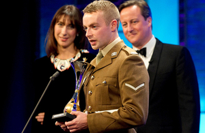 Prime Minister David Cameron and wife Samantha presented the award for Best Reservist to Lance Corporal Keith Mallon (library image) [Picture: Copyright The Sun]